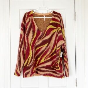 NWT FREE PEOPLE Primrose Animal Print V-neck sweater size XS wool blend